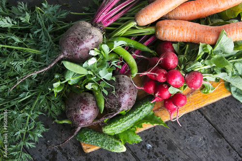 Fresh vegetables  on wooden background.