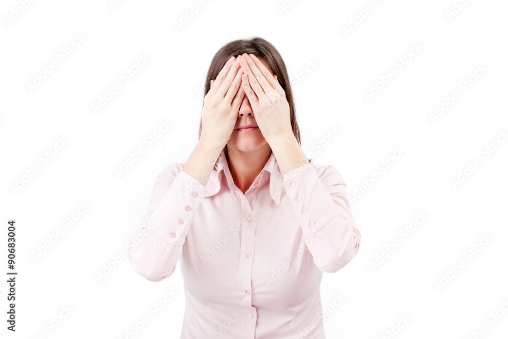 Young businesswoman covering her eyes with hands. Young businesswoman covering her eyes with hands.