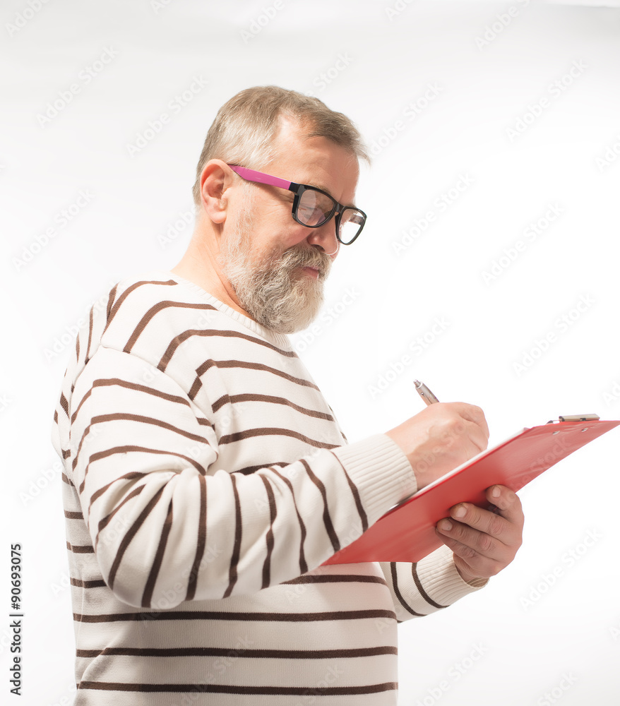 old man in glasses with documents old man in glasses with documents