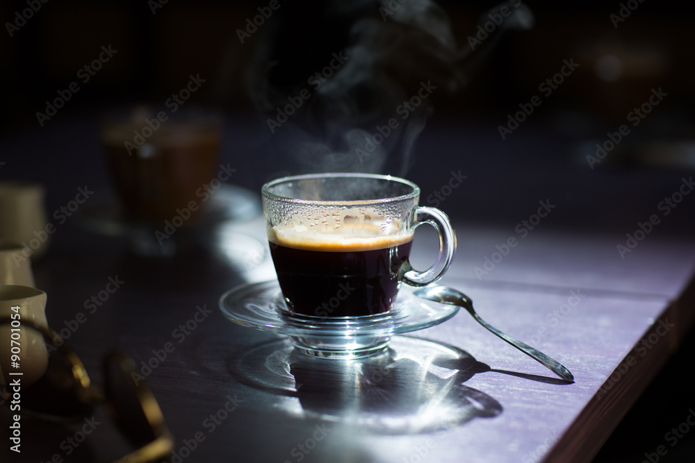 Fototapeta premium cup of hot coffee on the table