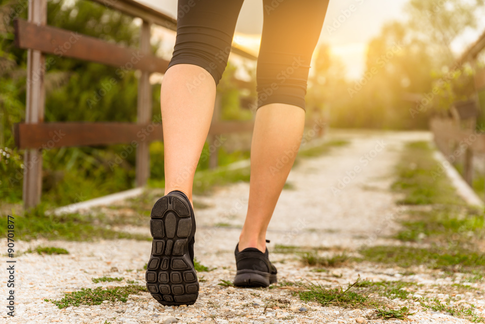 Runner woman's leg at the sunset. Runner woman's leg at the sunset.