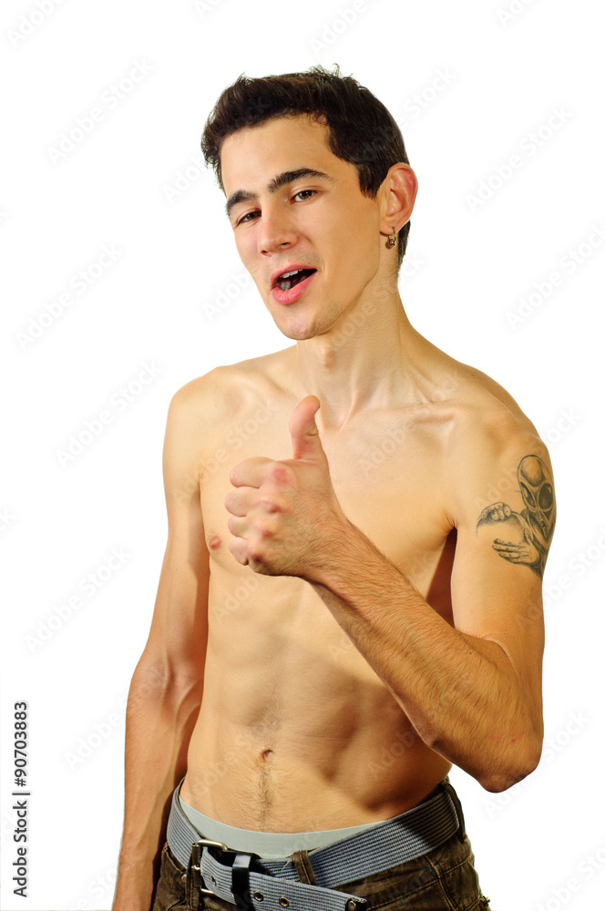 Young man with nude torso showing thumb up Young man with nude torso showing thumb up