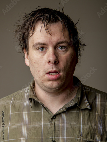 Man who looks like he just woke up
