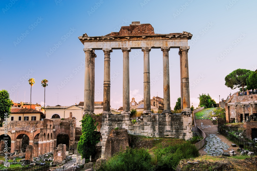  view of ancient ruins in Roman forum at sunset, Rome, Italy