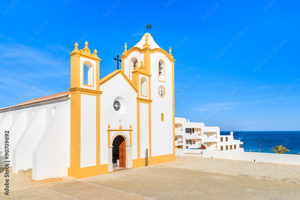 Typical church in Luz town on coast of Portugal