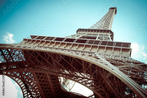 Beautiful Eiffel Tower in Paris France with retro tone filter effect © littleny