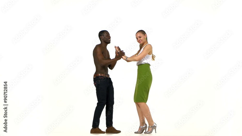 Social latino dancers girl with ponytail and afro american man Social latino dancers girl with ponytail and afro american man