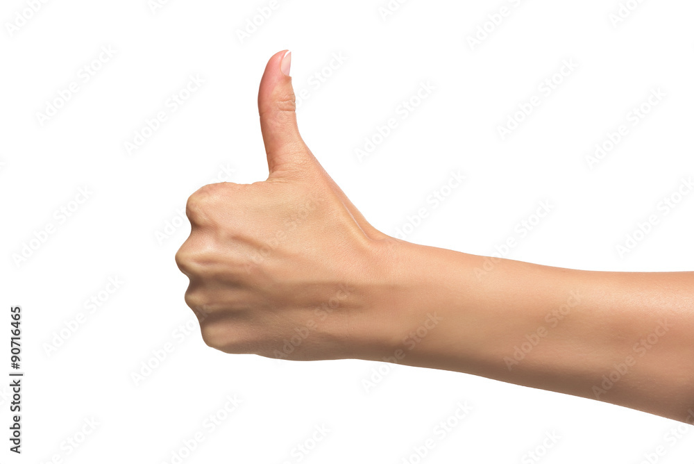 Woman hand with thumb up.
