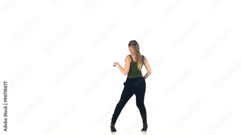 Beautiful latin dancer in action, on white, slow motion Beautiful latin dancer in action, on white, slow motion