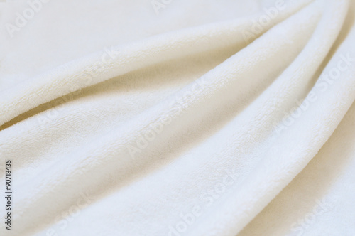 Beige background of plush fabric