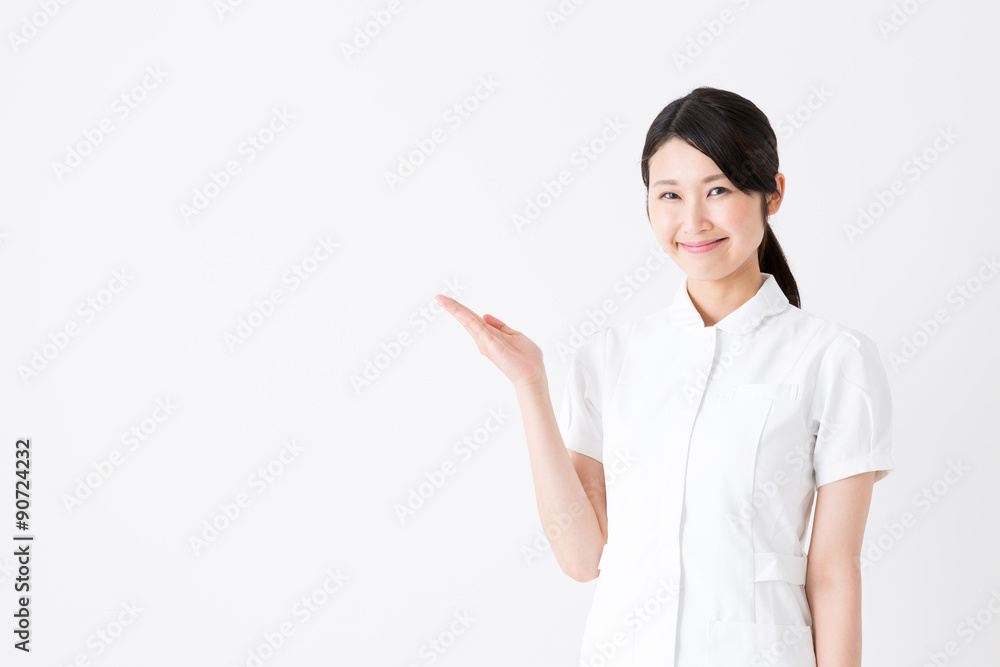 young asian nurse on white background