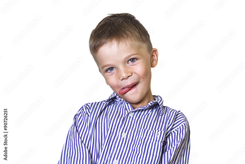 Funny 6-year-old boy showing tongue Funny 6-year-old boy showing tongue