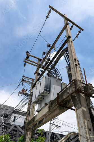 electricity post on blue sky background.