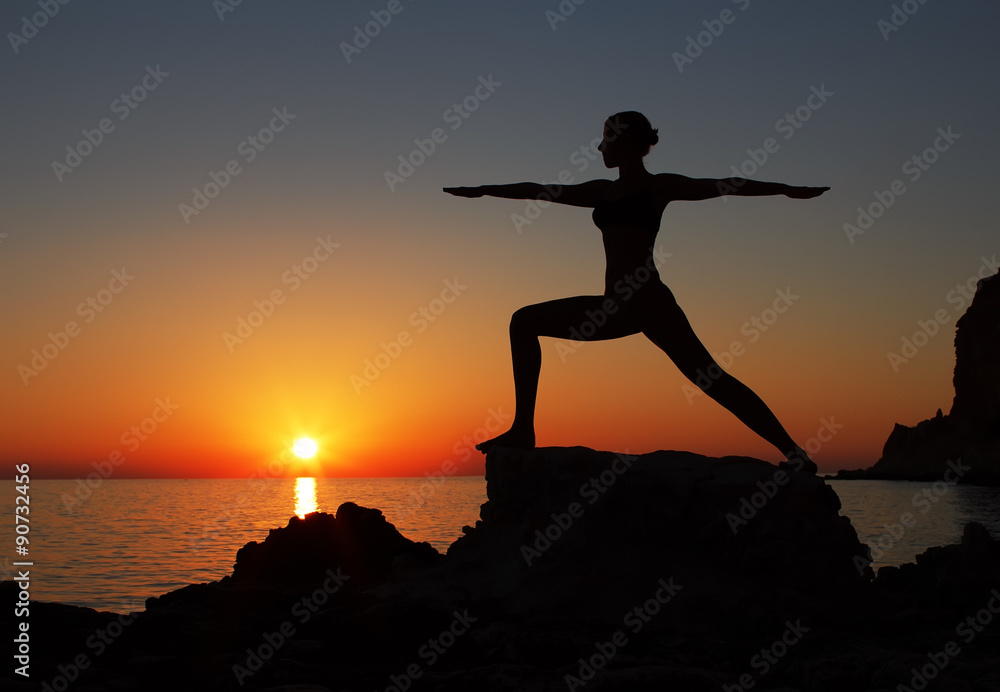 serenity and yoga practicing at sunset, meditation.Twilight in Goa state,India