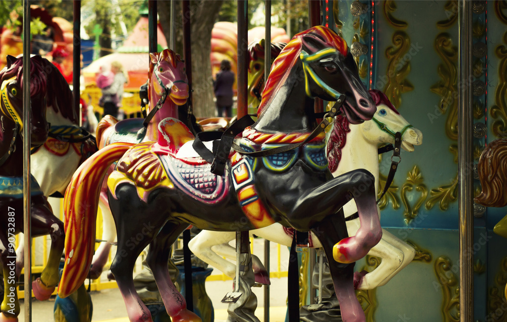 Old Carousel Horse closeup in the park