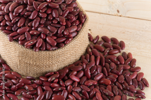 red beans on wood background