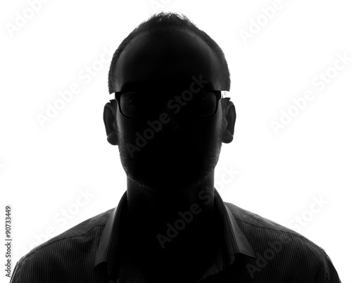 Hidden face in the shadow.male silhouette. photo