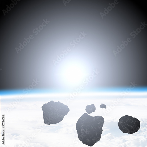 Fototapeta Naklejka Na Ścianę i Meble -  Asteroids on a starry background. 