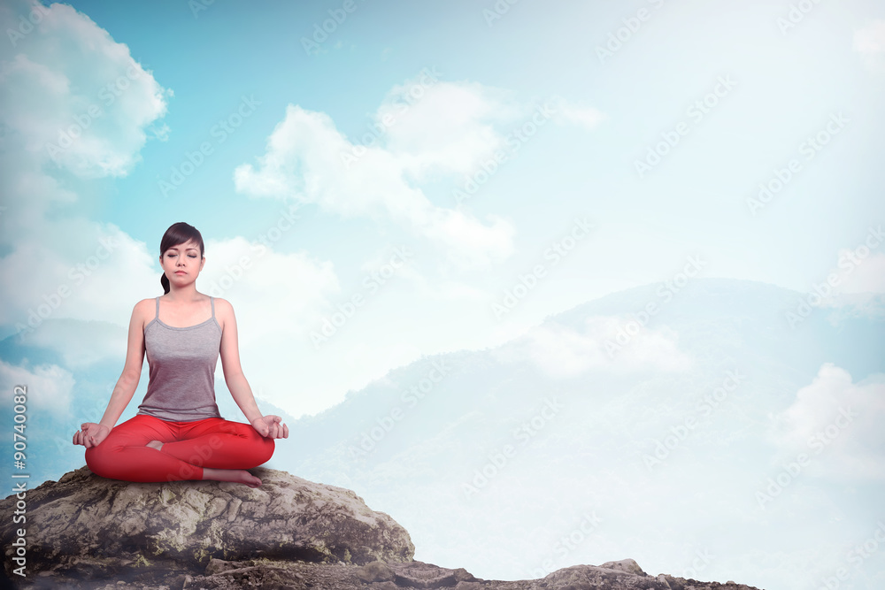 Woman Doing Yoga At The Mountain