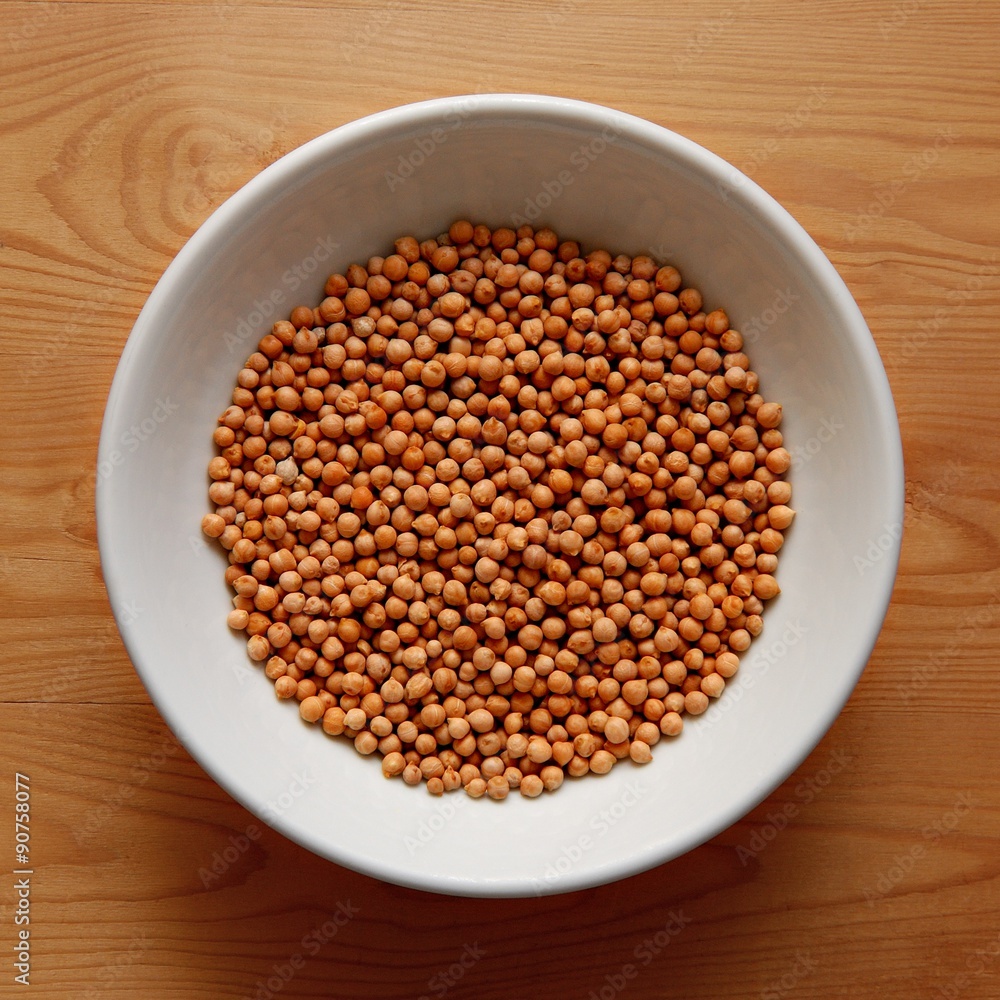 White Bowl with Chickpeas on Wooden Desk White Bowl with Chickpeas on Wooden Desk