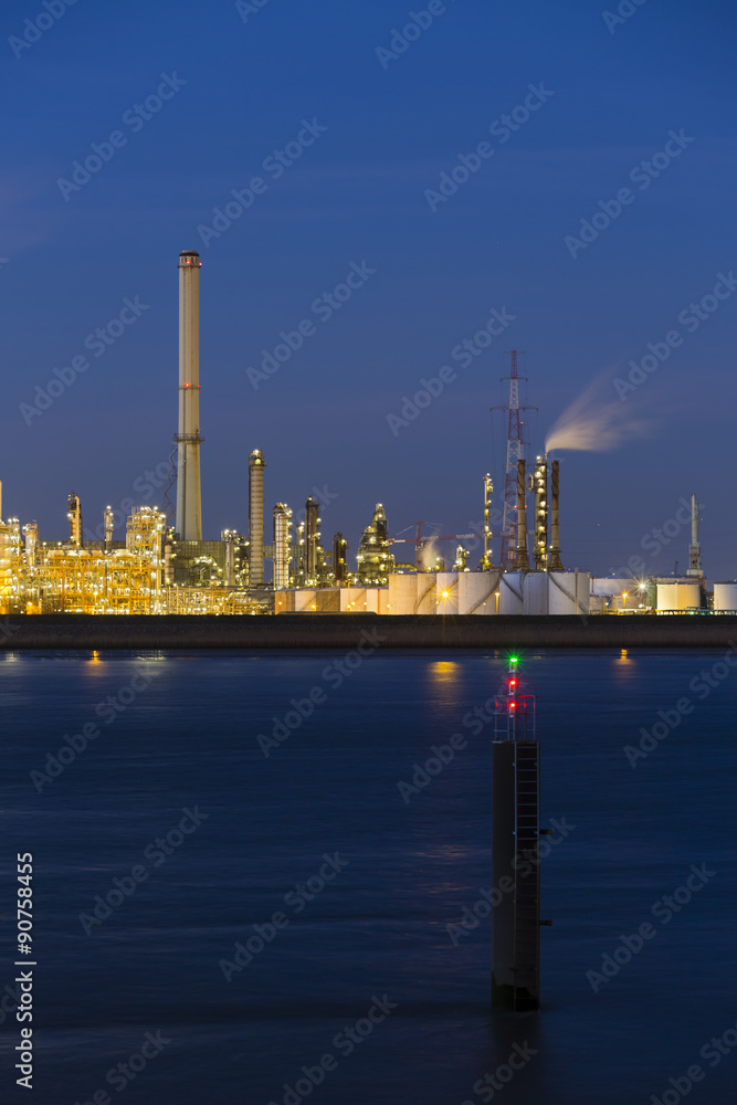 Fototapeta premium Chemical Plant In Harbor At Night