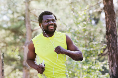 African American man joggin...