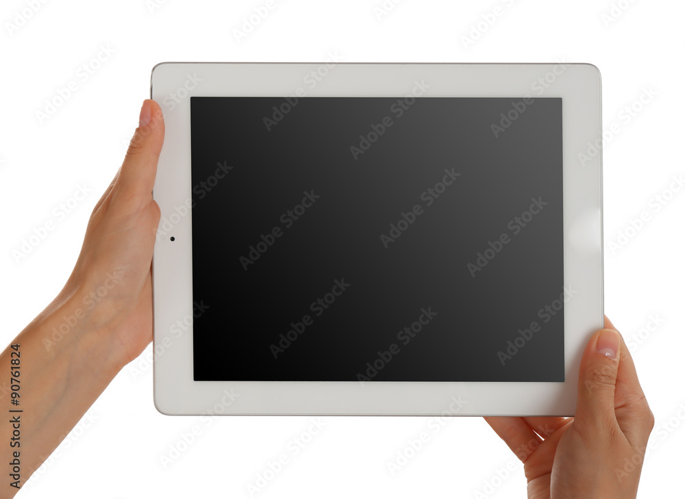 Female hands holding tablet with blank screen isolated on white Female hands holding tablet with blank screen isolated on white