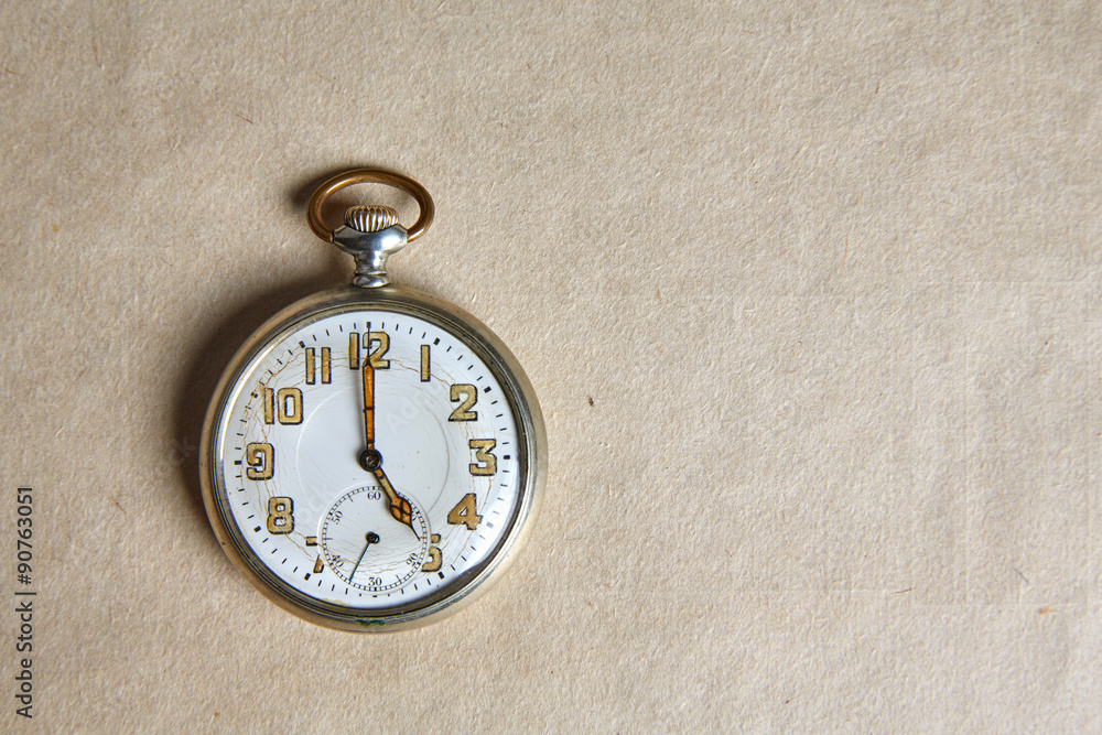 Old pocket watch on old paper Old pocket watch on old paper