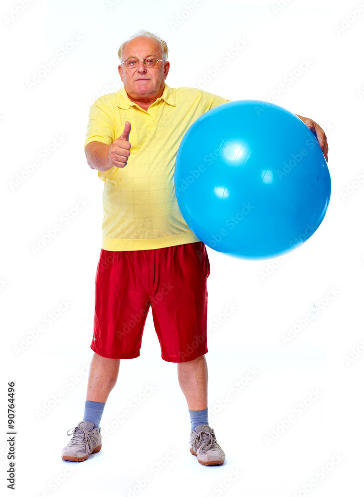 Elderly man with exercise ball.