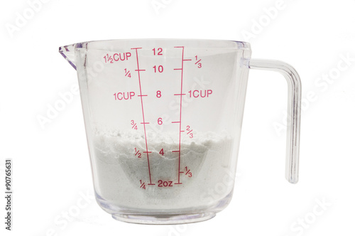 Measuring Cup with Flour 1/2