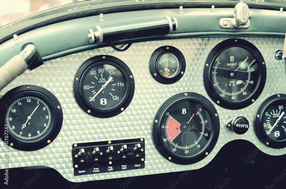 Retro car dashboard with gauges
