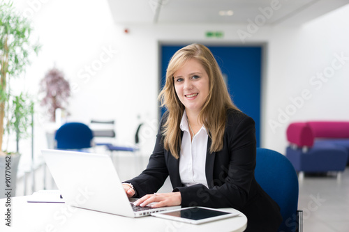 Businesswoman sitting at her desk in an office