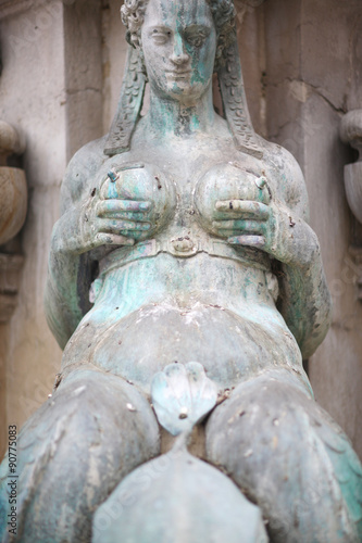 Closeup of a lactating nereid, the Fountain of Neptune, Bologna, Italy