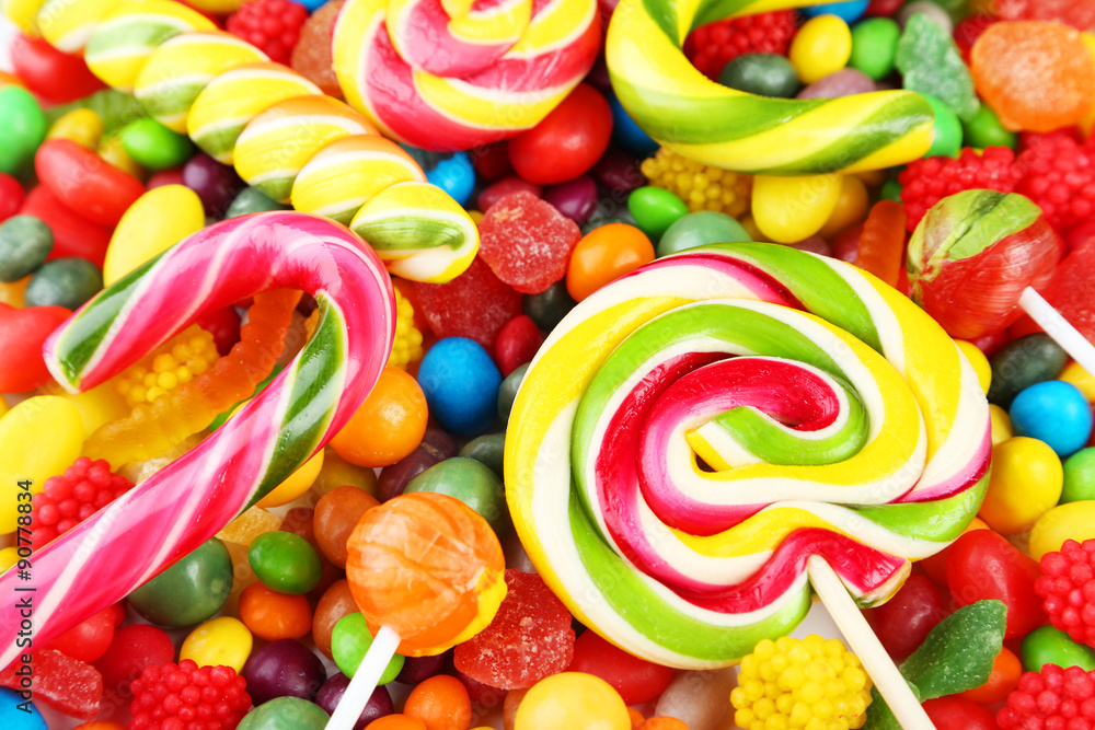 Different fruit candies background