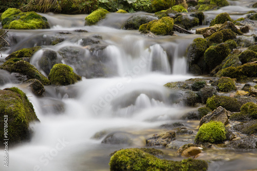 Fototapeta Naklejka Na Ścianę i Meble -  mountain waterfall with green rock