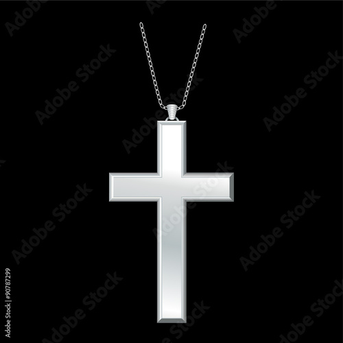 Silver Christian Cross with necklace chain, jewelry crucifix isolated on a black background.
