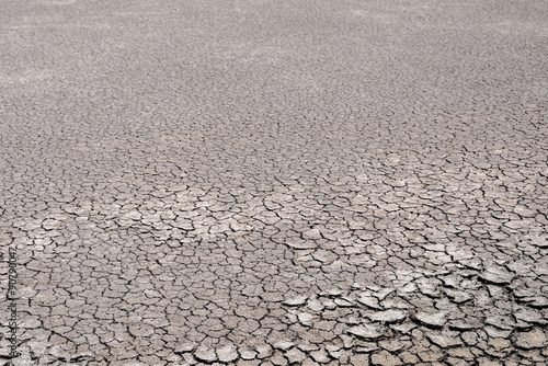Dry cracked earth due to rainless.
