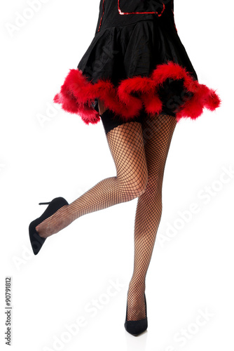 Woman legs wearing devil clothes