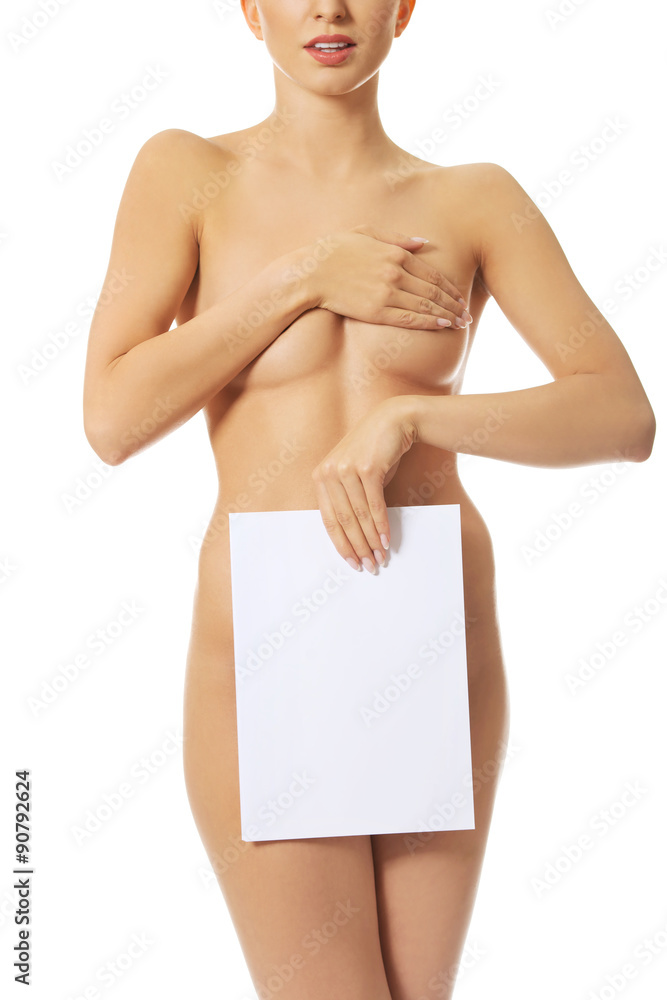 Young naked woman holding blank banner.
