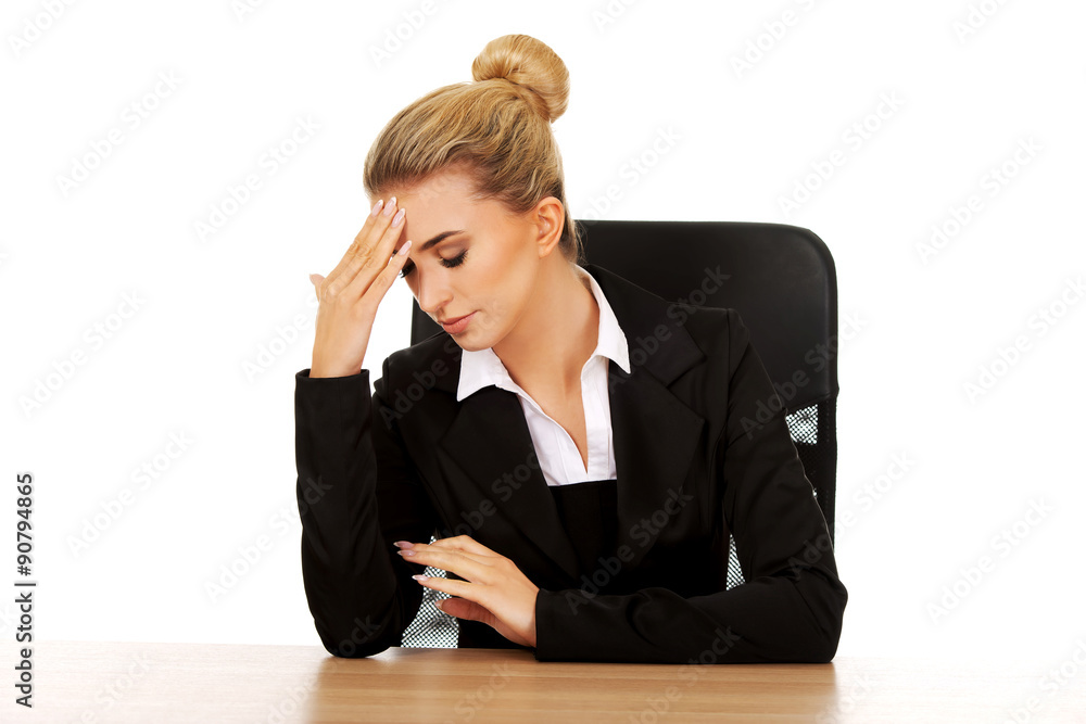Beautiful businesswoman having huge headache Beautiful businesswoman having huge headache