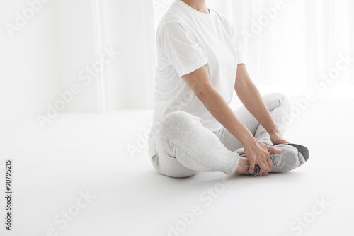 Fotografie Women have a stretch of the hip joint