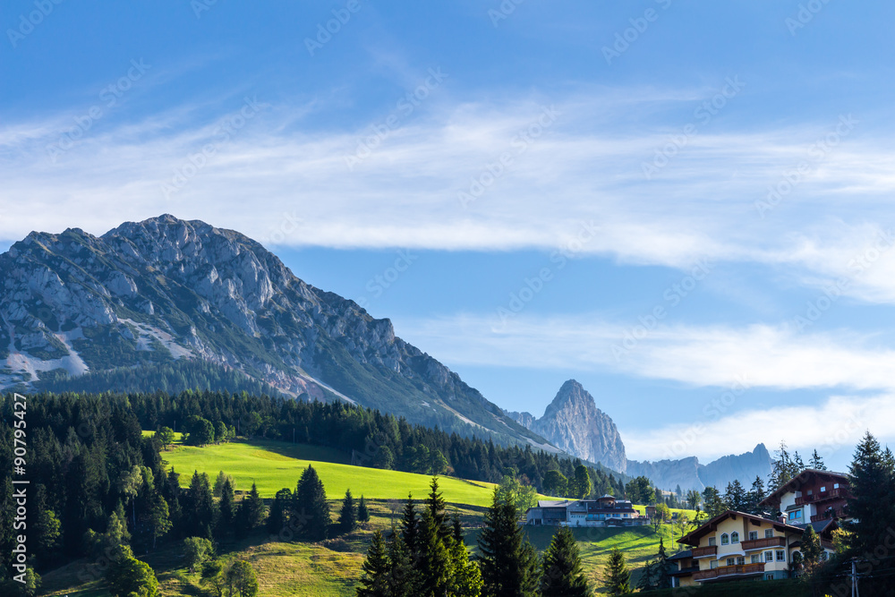 Landscape of mountains, green field, sky, forest in Filzmoos, Salzburg, Austria