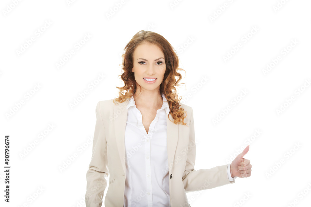 Businesswoman with thumbs up gesture. Businesswoman with thumbs up gesture.