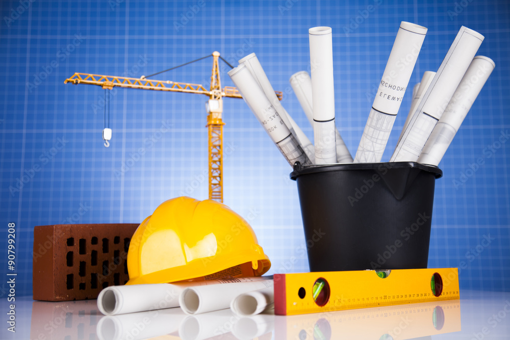 Crane, Safety helmet, Blueprints and construction site Crane, Safety helmet, Blueprints and construction site