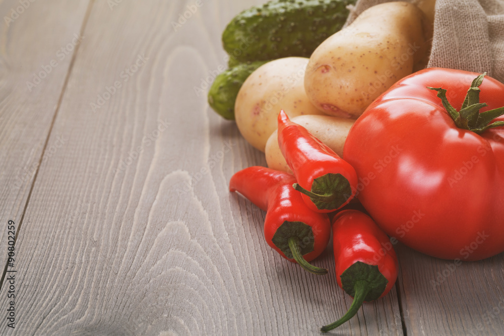 organic raw vegetables on wood table organic raw vegetables on wood table