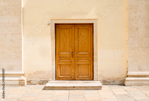 Wooden doors in wall