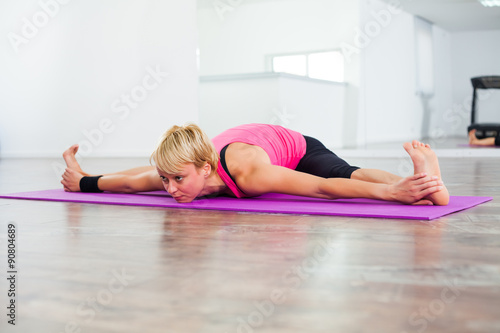 Young woman practicing yoga, Upavista konasana