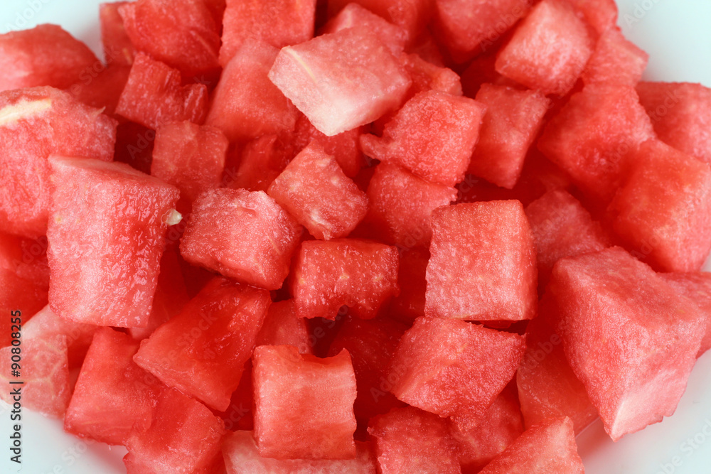 watermelon on a plate on a wooden background watermelon on a plate on a wooden background