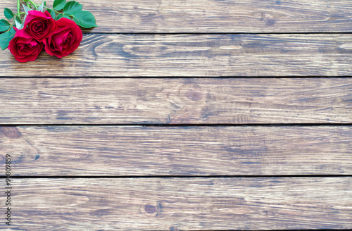 roses on a wooden background © rm211171
