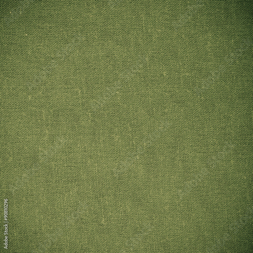 Closeup of green fabric textile material as texture or background